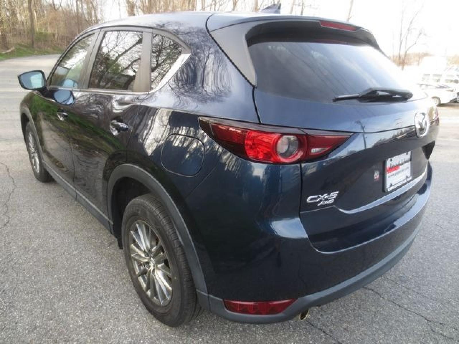 2017 Blue /Tan Mazda CX-5 Touring AWD (JM3KFBCLXH0) with an 2.5L L4 DOHC 16V engine, Automatic transmission, located at 270 US Route 6, Mahopac, NY, 10541, (845) 621-0895, 41.349022, -73.755280 - Photo #4
